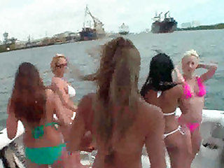 Group of college lesbians licking and fingering each other on a boat